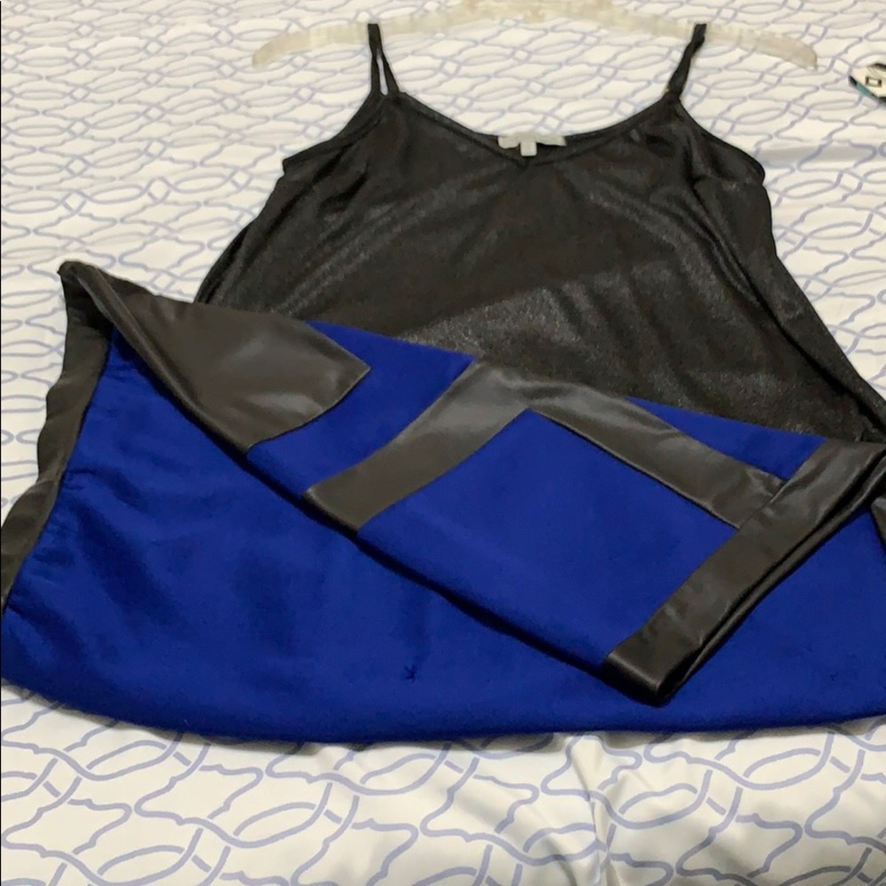 Shiny black tank top with mini skirt